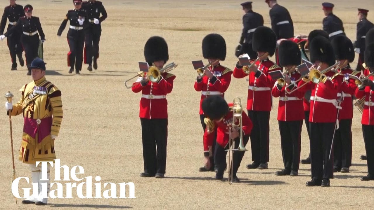Soldier faints during trooping the colour rehearsal in London heatwave