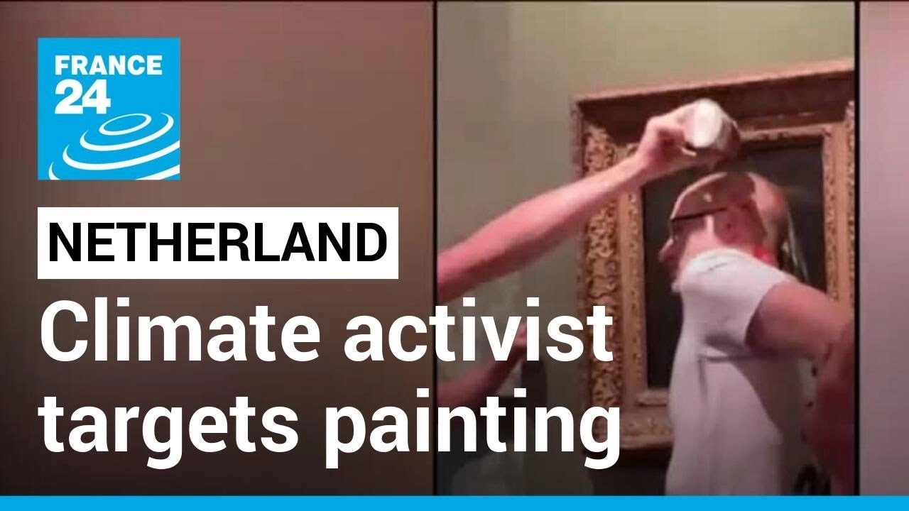Climate activist glues his head to Vermeer's painting "The Girl with a Pearl Earring" • FRANCE 24