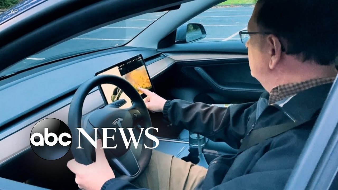 NHTSA opens investigation over Tesla's touch-screen gaming feature l ABC News