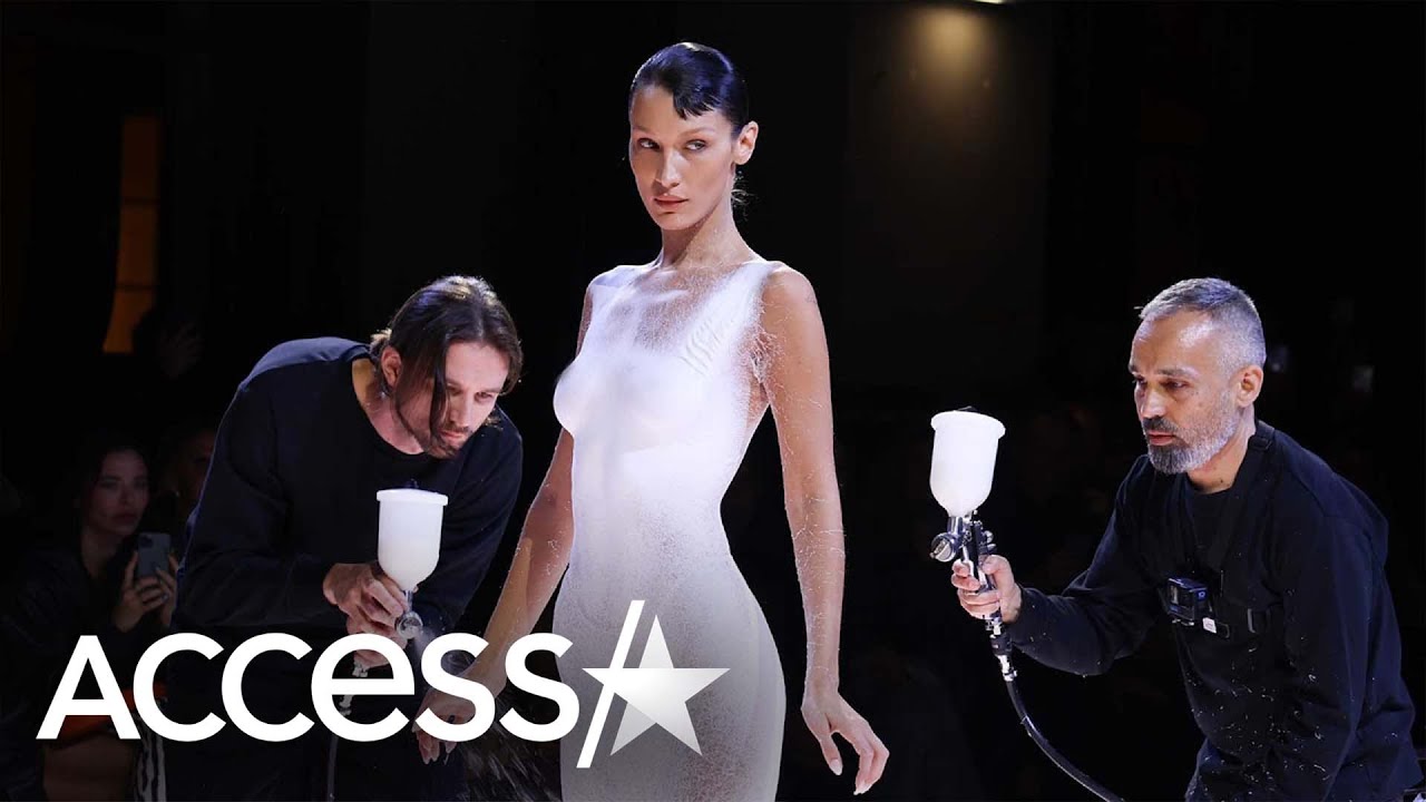 Bella Hadid Gets Dress Spray-Painted Onto Her Mid-Fashion Show