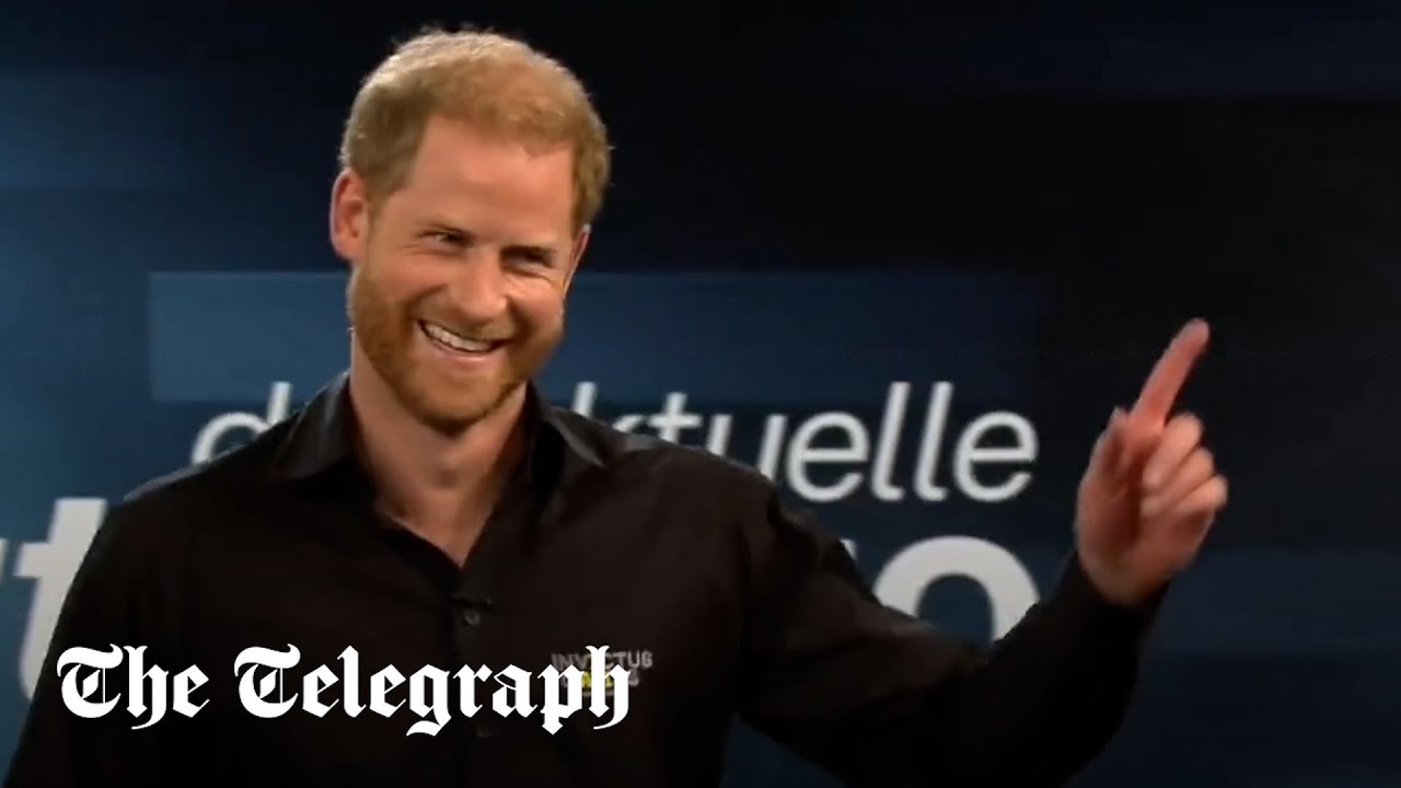 Prince Harry thrashed by German defence minister in penalty shoot out on TV show