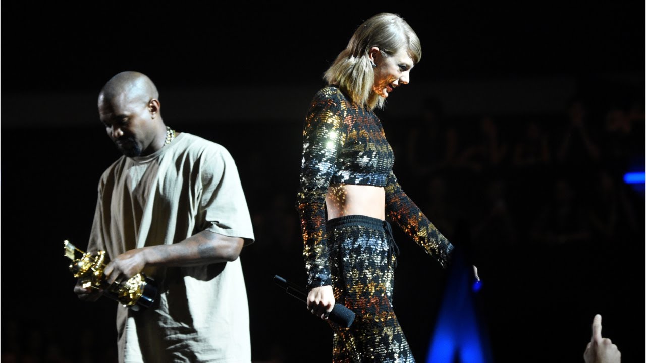 Taylor Swift laughs while performing Kanye West diss track