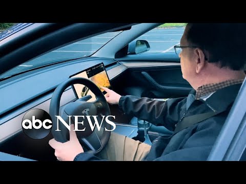 NHTSA opens investigation over Tesla's touch-screen gaming feature l ABC News