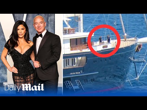 Jeff Bezos kisses girlfriend Lauren Sanchez aboard £500M 'super yacht'