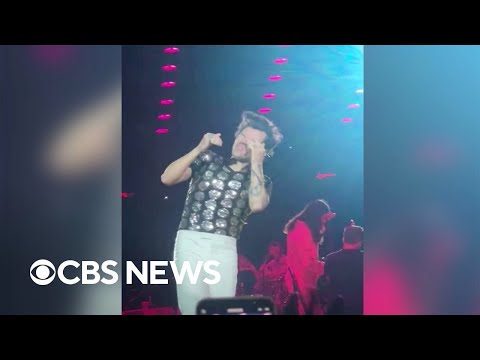 Harry Styles hit in the eye with Skittles during "Love on Tour" concert