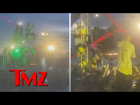 Travis Scott Stops Concert and Orders Fans Dangling from Truss to Get Down | TMZ