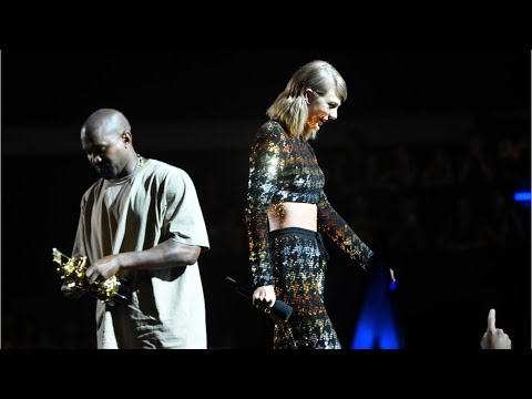 Taylor Swift laughs while performing Kanye West diss track