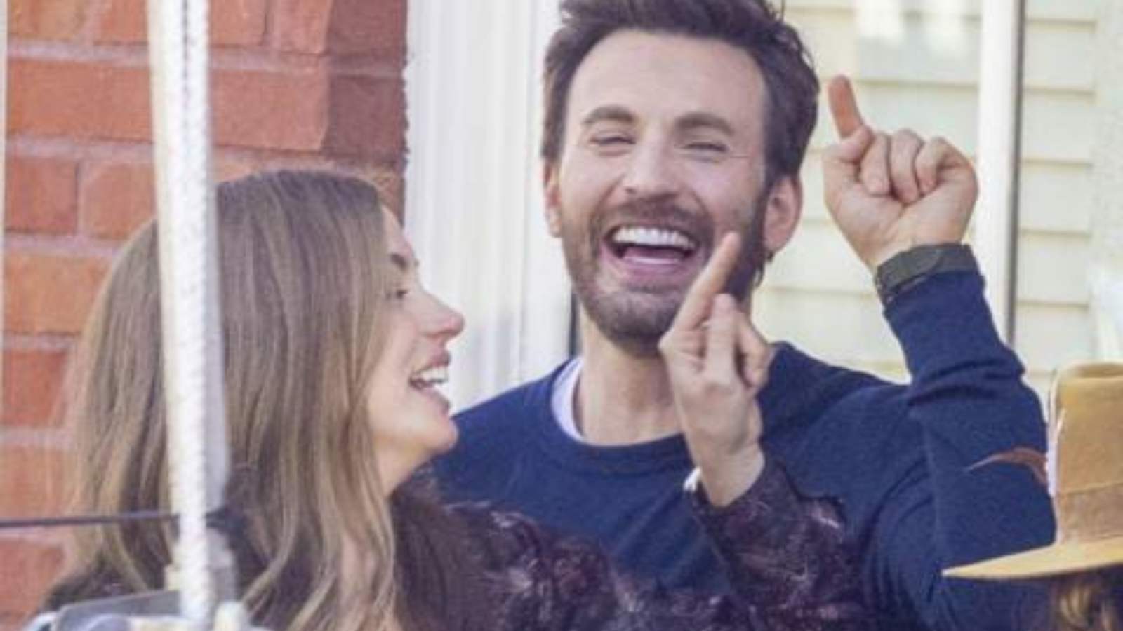 Ana and Chris Evans laughing together at their new project's set