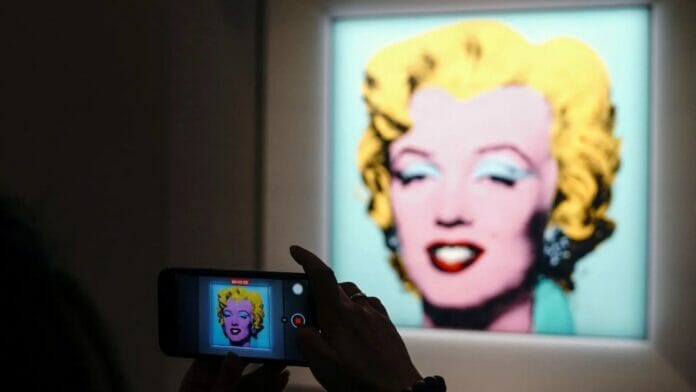 Andy Warhol’s “Shot Sage Blue Marilyn”.