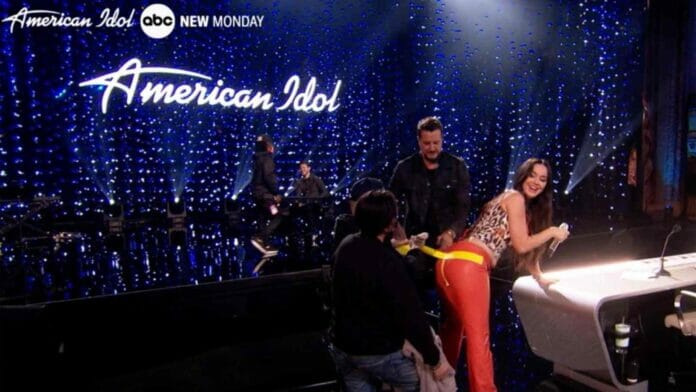 The American Idol judge, Katy Perry then had her pants taped back up on-screen