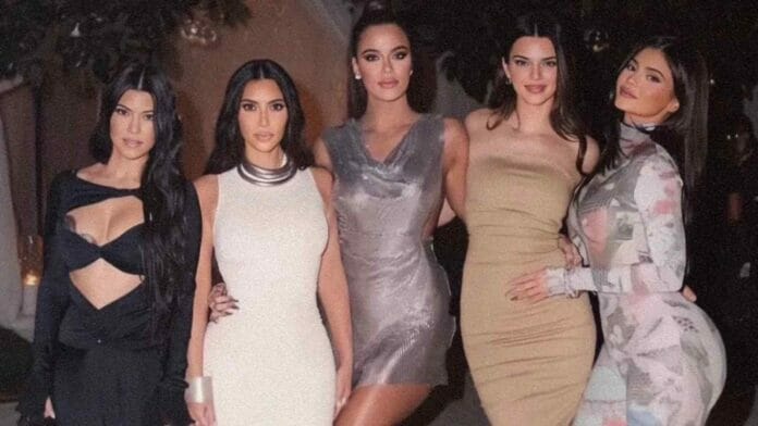 Kourtney, Kim, and Khloé Kardashian and Kendall Jenner and Kylie Jenner posing for a sisters photo
