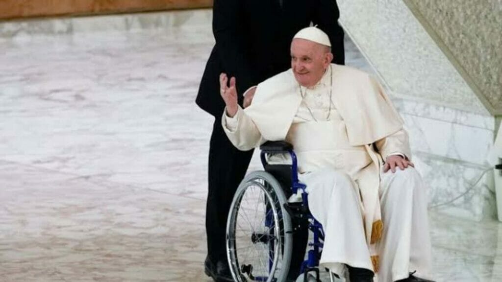 Pope Francis in a wheelchair due to weak knees