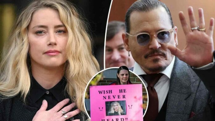 A supporter of Depp holding a sign outside the Fairfax County Circuit Court in Fairfax, Virginia, on April 11, 2022.